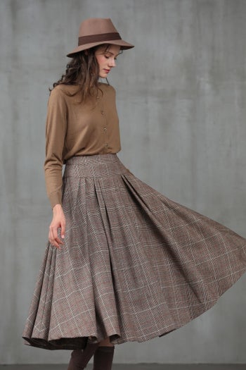 close-up of model wearing the plaid skirt