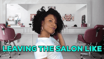 Actor Shalita Grant shakes her natural curls and walks away with the caption: &quot;Leaving the salon like&quot;