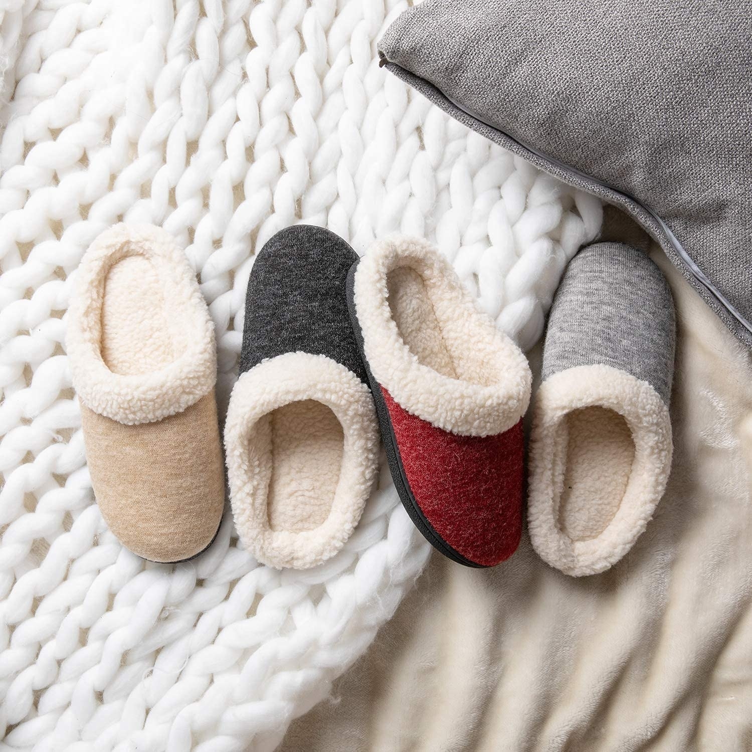 four sherpa slippers, each in a different color