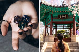 A woman is holding zodiac dice with a monument in South Korea shown