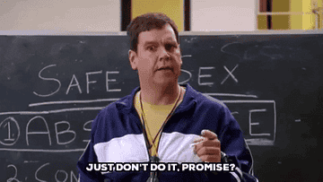 Dwayne Hill as Coach Car stands in front of a chalkboard that reads &quot;Safe Sex&quot; and says &quot;Just don&#x27;t do it, promise?&quot; in &quot;Mean Girls&quot;