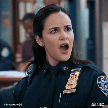 Melissa Fumero as Amy Santiago turns with shock and gasps in &quot;Brooklyn Nine-Nine&quot;