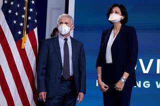 Anthony Fauci and Rochelle Walensky in front of an American flag.