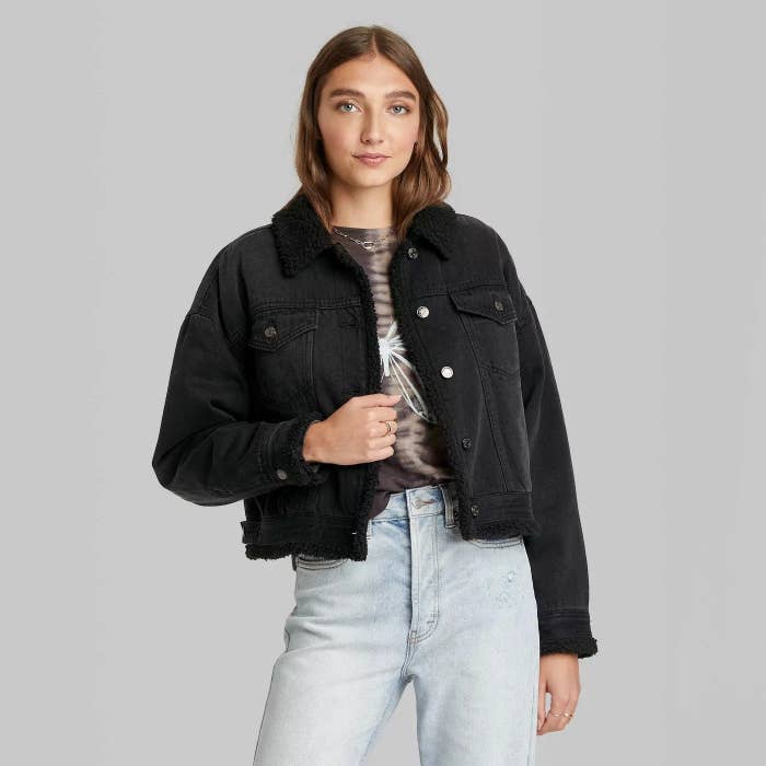 model wearing the jacket in black