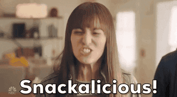 A GIF of a person saying snackalicious