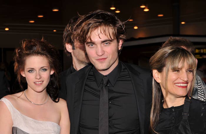 Kristen and Robert pose with Catherine