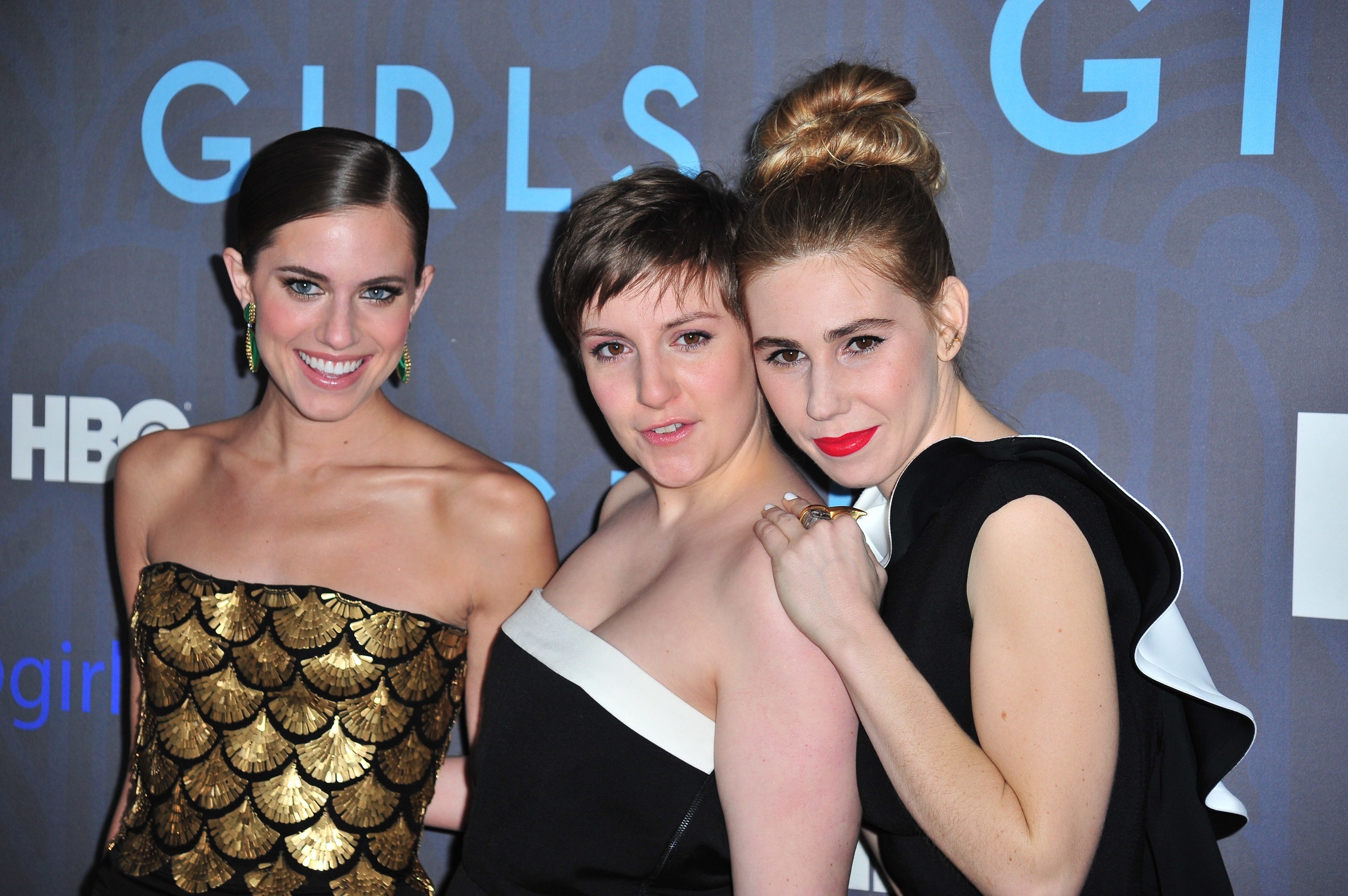 Williams, Dunham, and Mamet pose for a photo on the red carpet