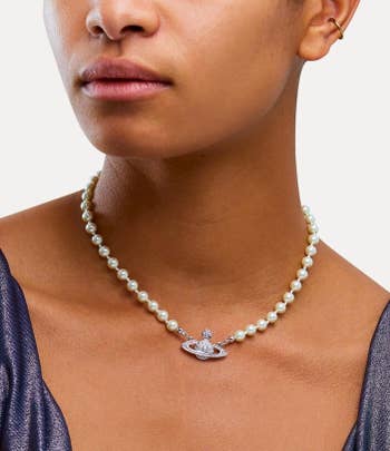 Model wearing the Vivienne Westwood pearl necklace