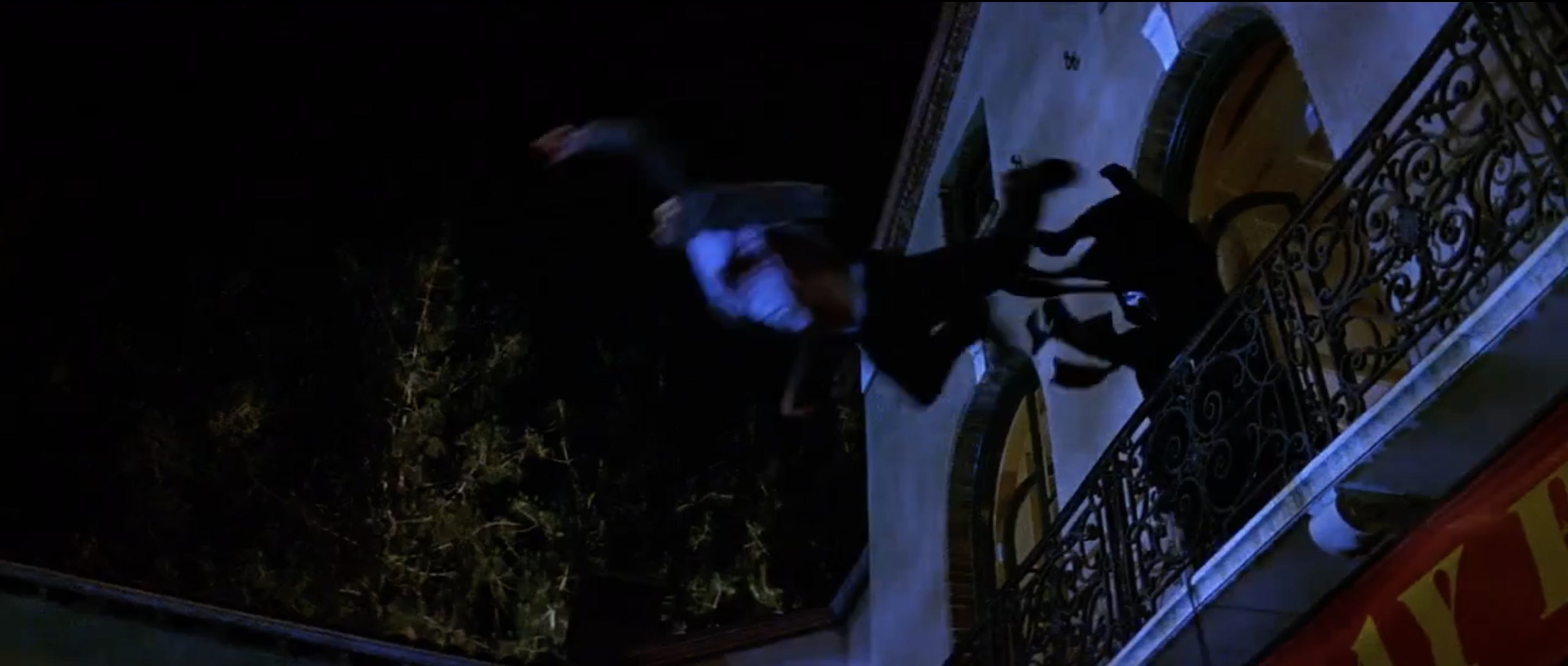 Deon Richmond is thrown off a balcony by ghostface