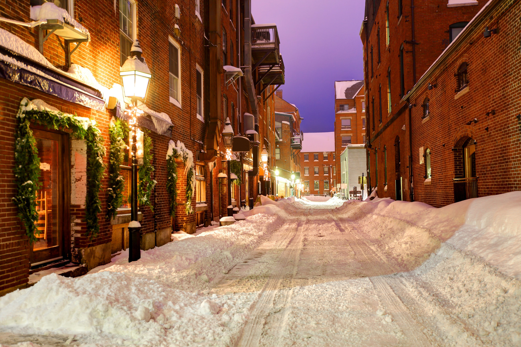 A New England street covered in snow.