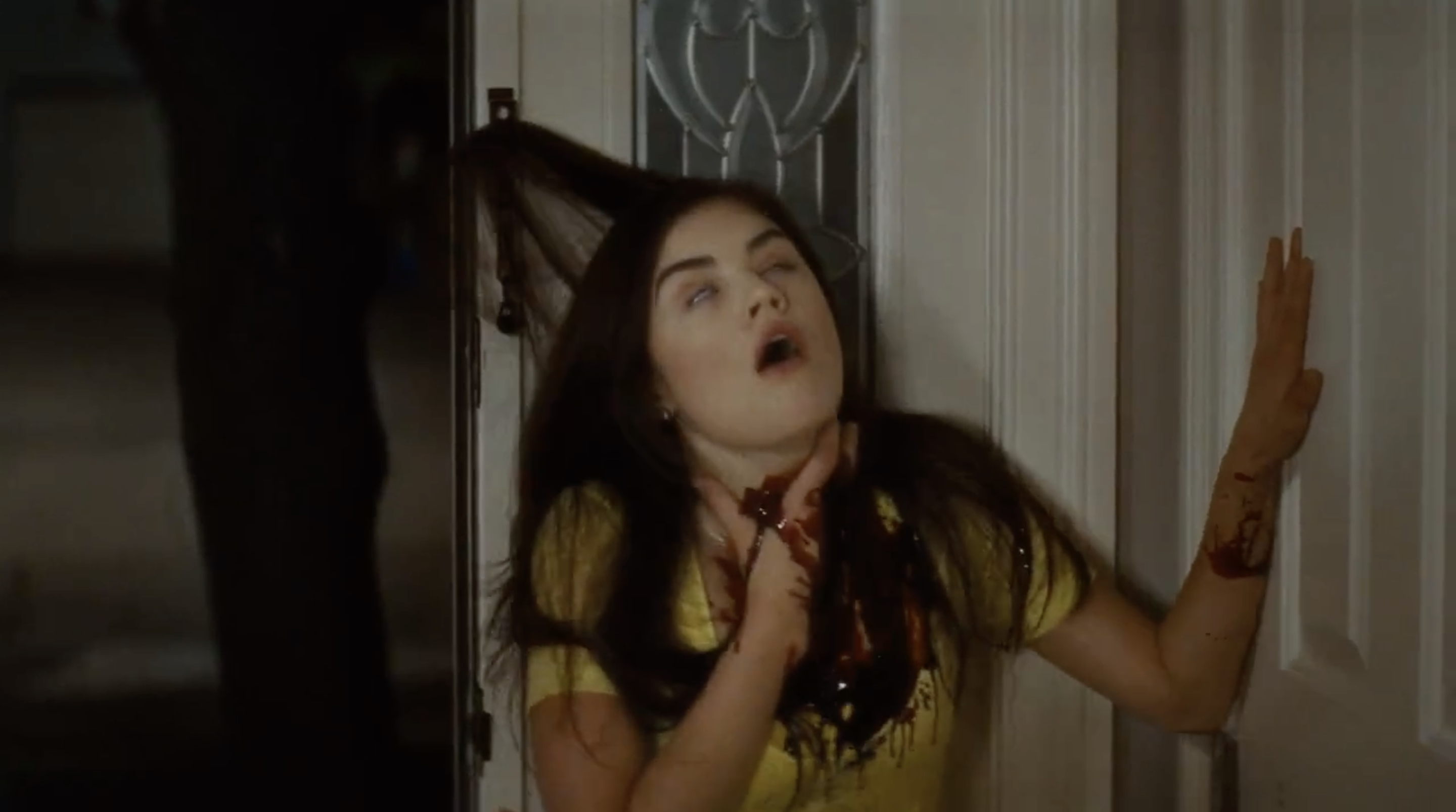 Lucy Hale with a slit throat