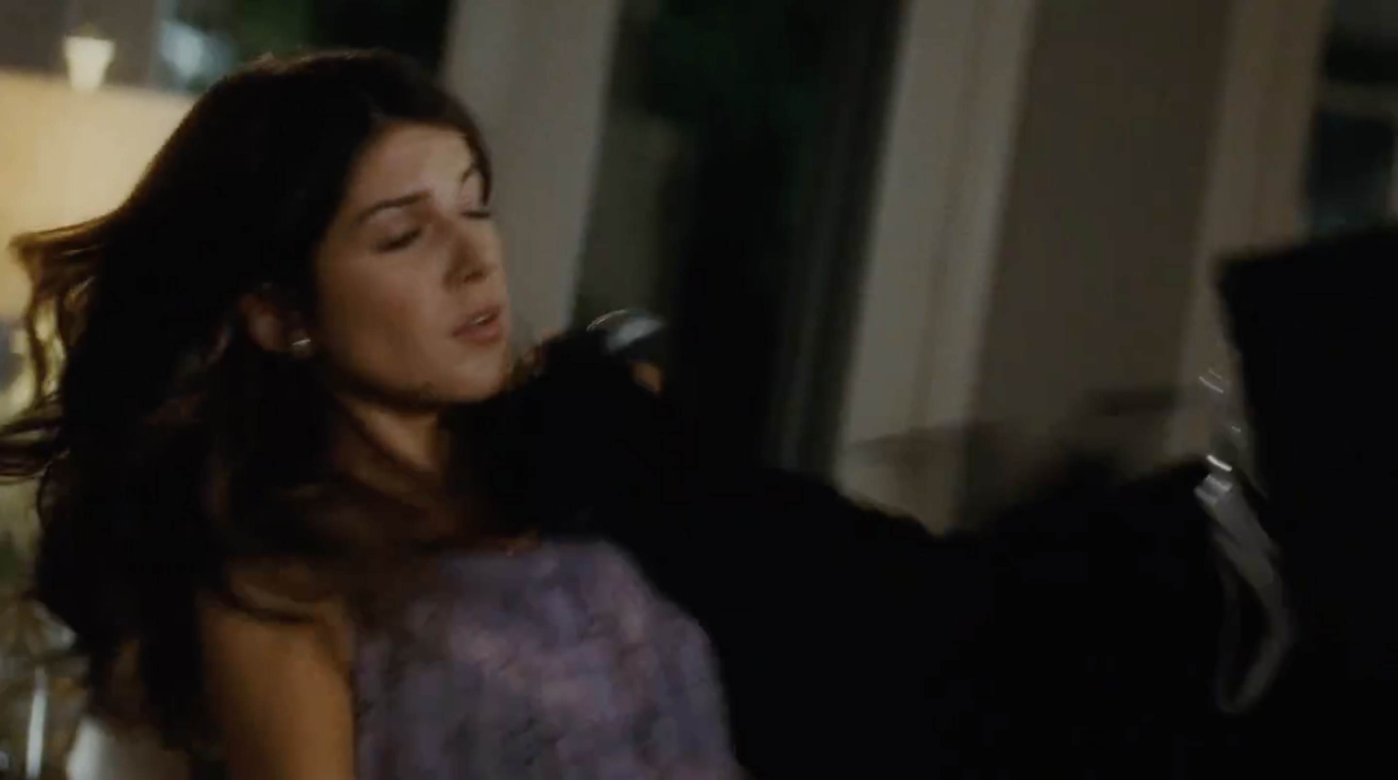 Shenae Grimes gets stabbed in the chest by Ghostface