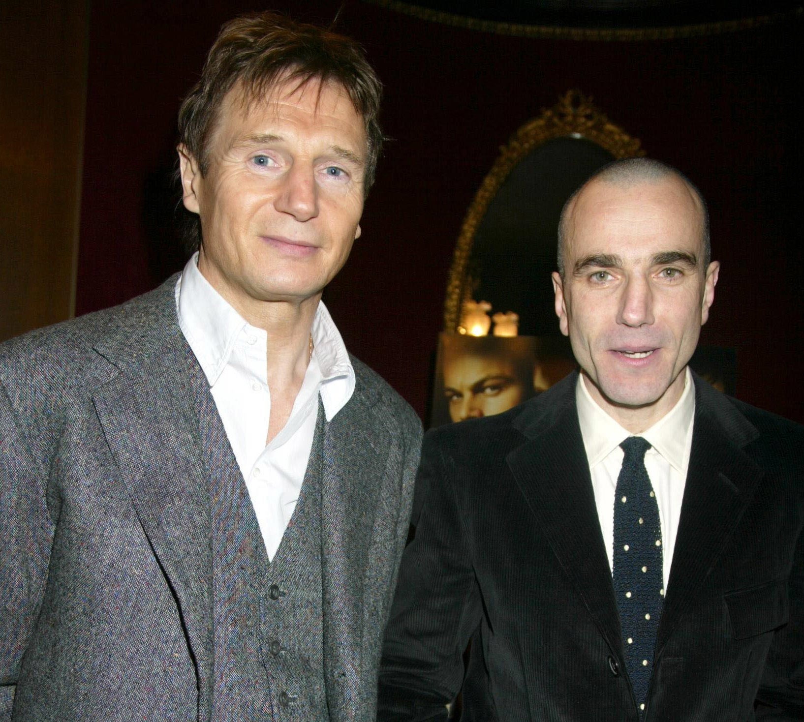 Liam Neeson posing next to Daniel Day Lewis