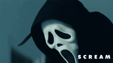Ghostface looks up with a knife