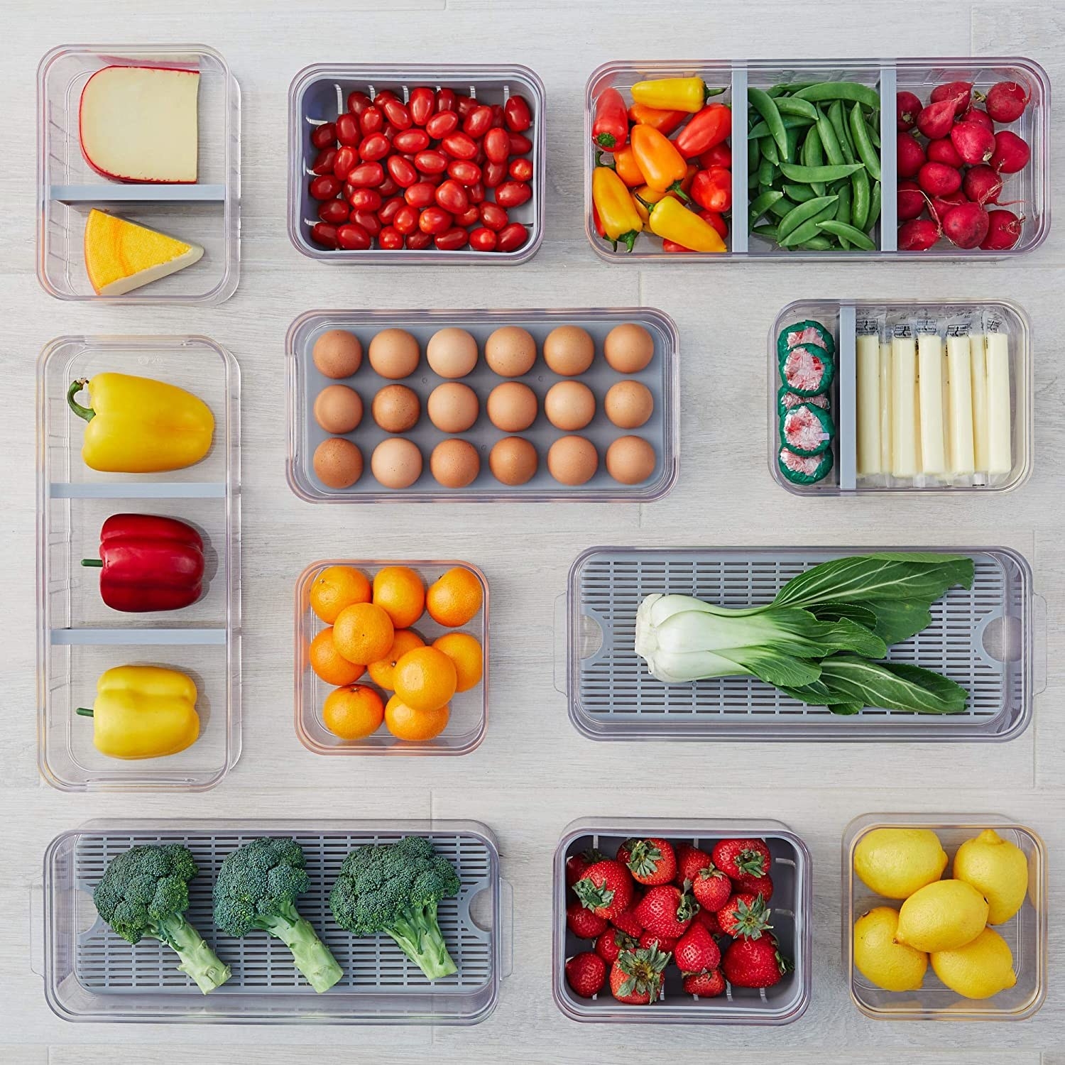 a flatlay of the different divided containers filled with fresh produce