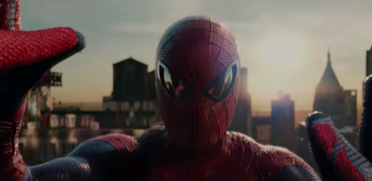 Peter, in his Spider-Man suit, staring at himself in a glass window in &quot;The Amazing Spider-Man&quot;