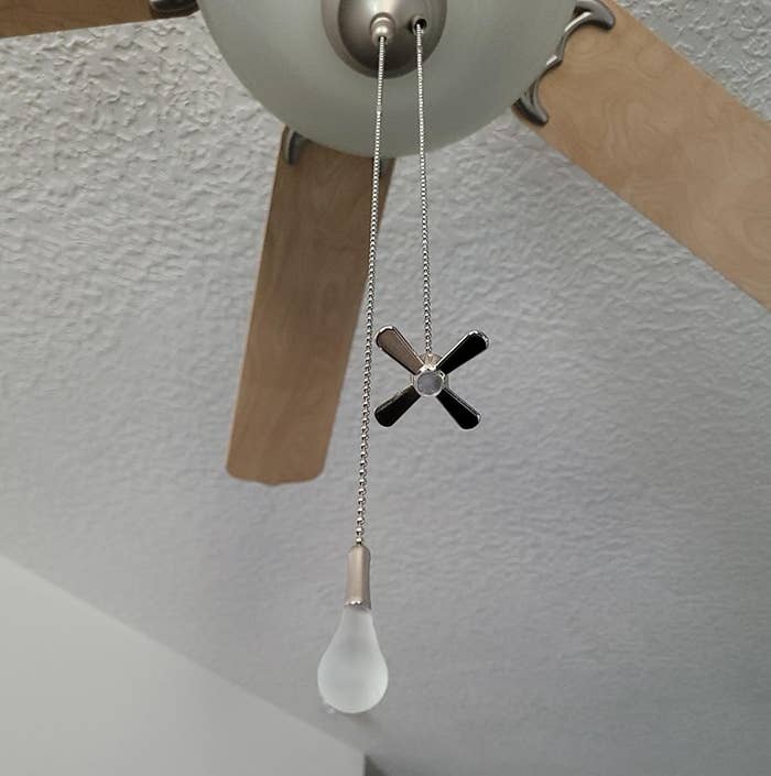 the charms attached to a reviewer&#x27;s ceiling fan