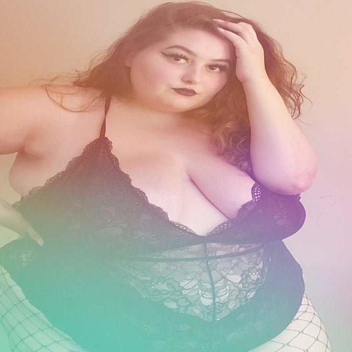 reviewer wearing the black bodysuit