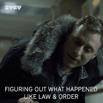 GIF of Harry in Resident Alien talking about Law & Order