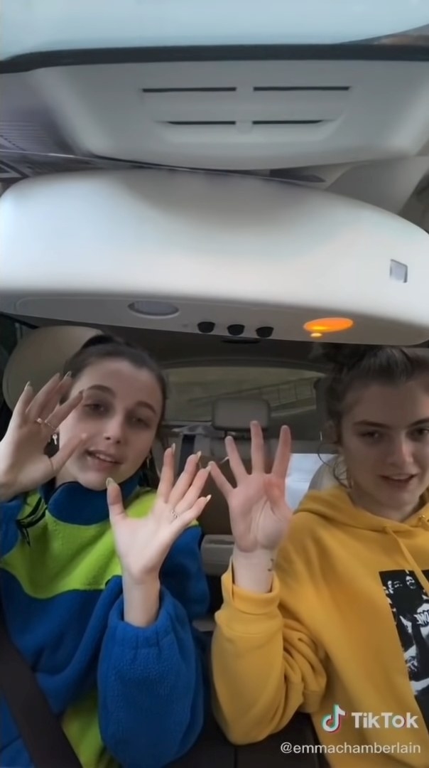 Emma and a friend doing a viral challenge