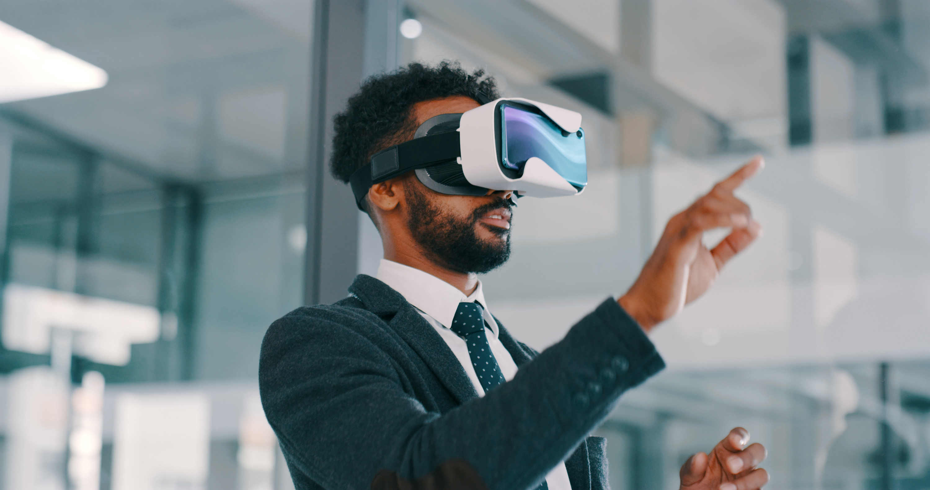 Businessman using a virtual reality headset in a modern office