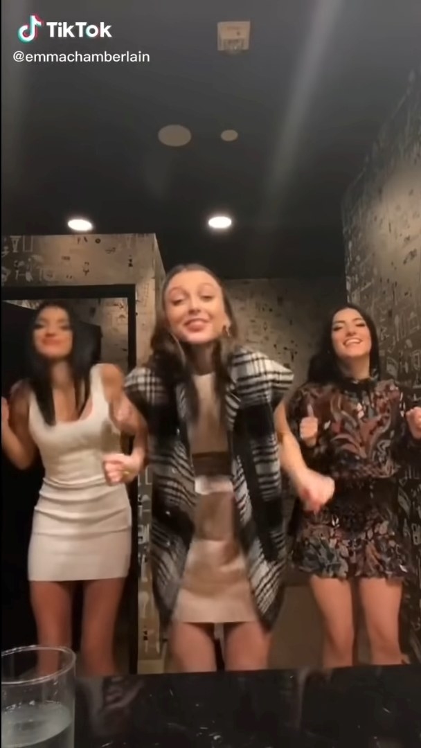 Emma dancing with two friends
