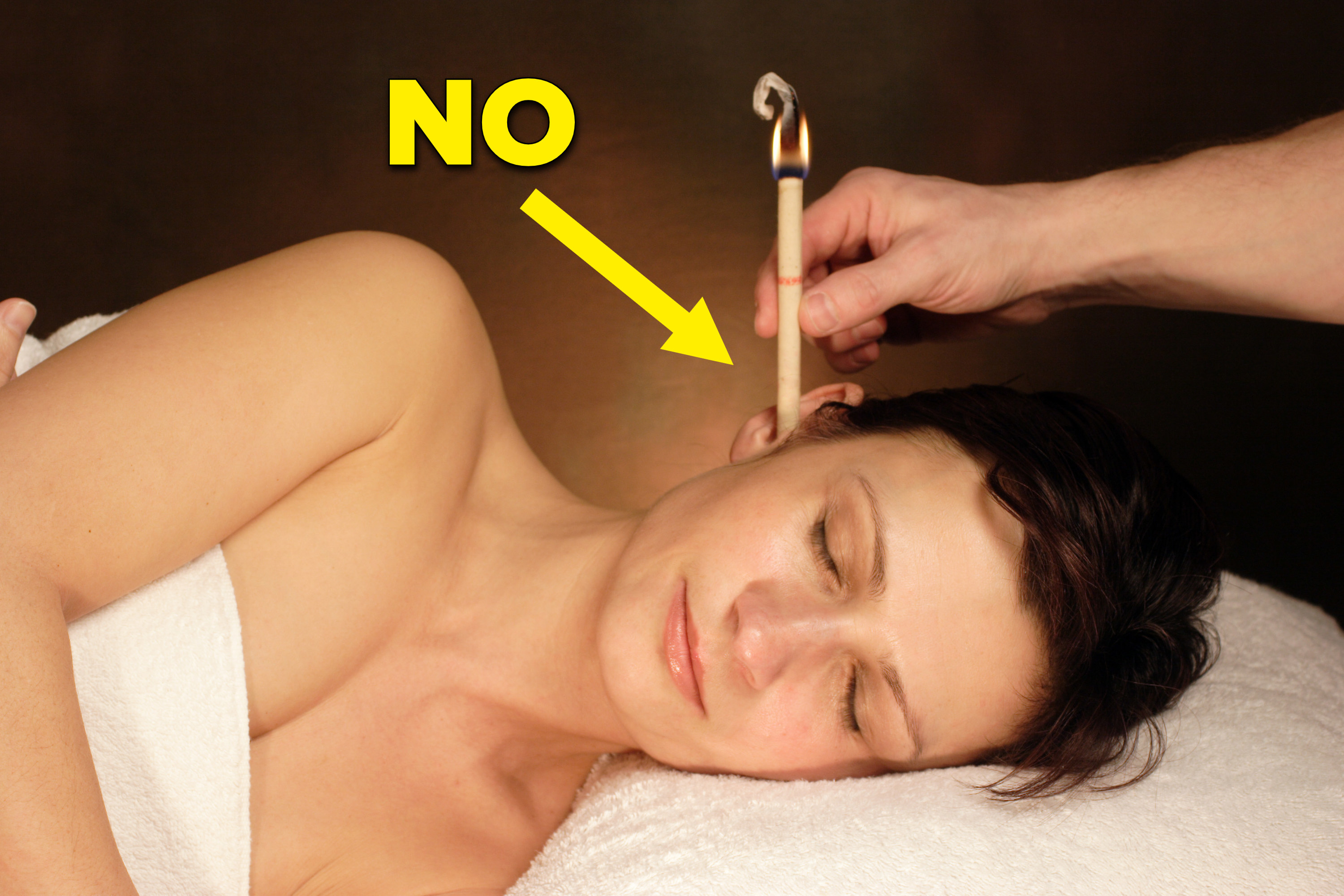 A woman with a candle in her ear, captioned &quot;NO&quot;