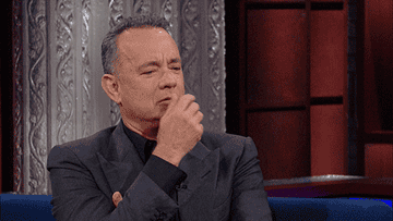 Tom Hanks thinking GIF