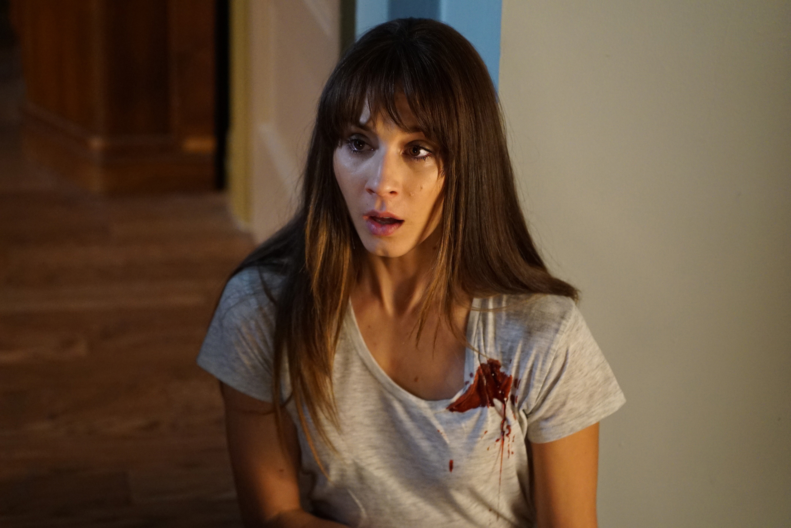 Spencer in &quot;Pretty Little Liars&quot; wearing bloody shirt and looking shocked