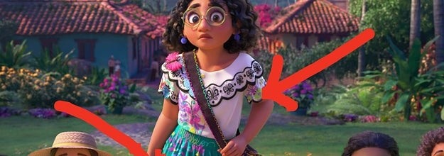 Mirabel from Encanto with red arrows pointing to her dress