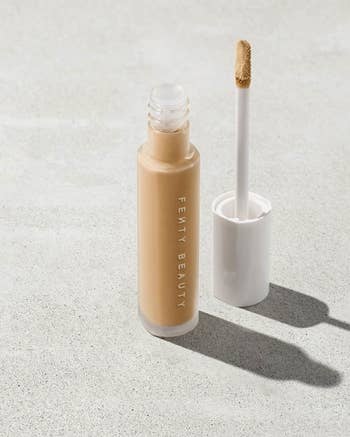an open tube of concealer