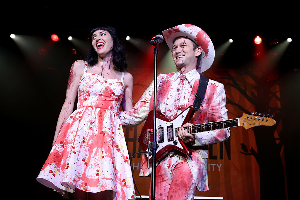 the couple is covered in blood singing onstage