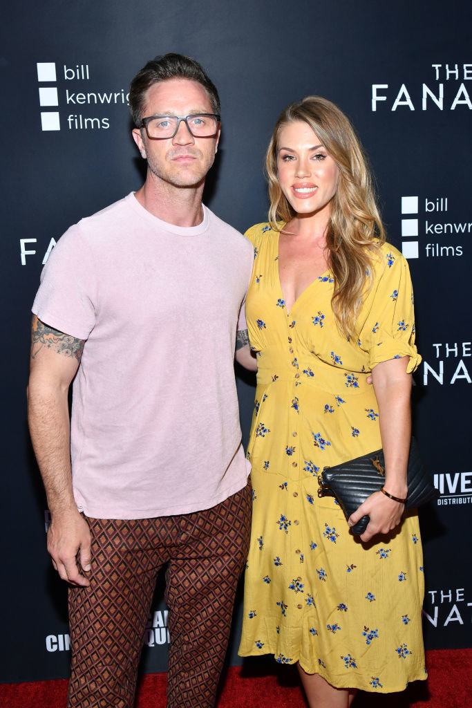 devon and his wife on a red carpet in 2019