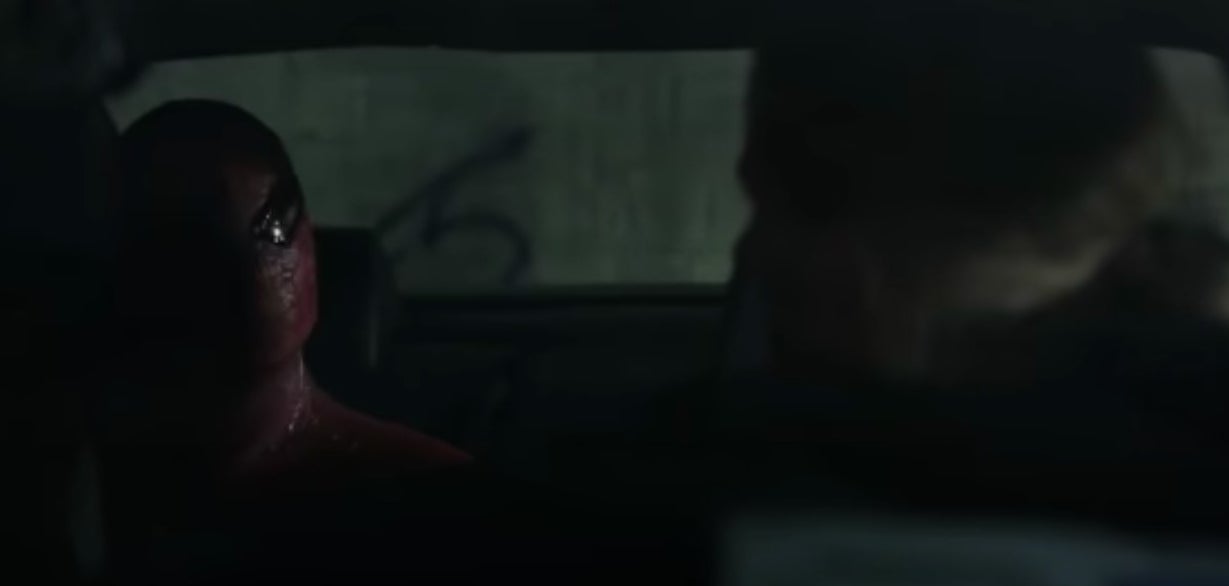 Spider-Man talking to a car thief inside a car in &quot;The Amazing Spider-Man&quot;