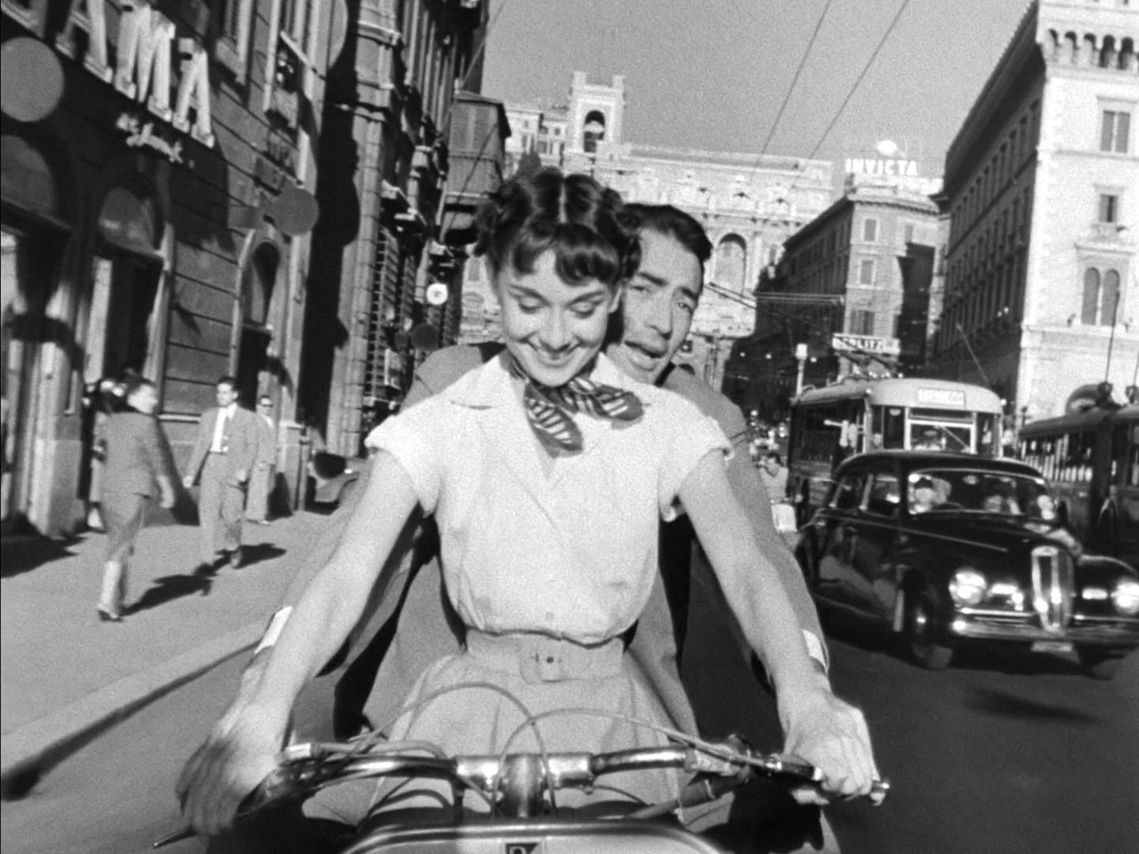 Audrey and Gregory on a motor bike together