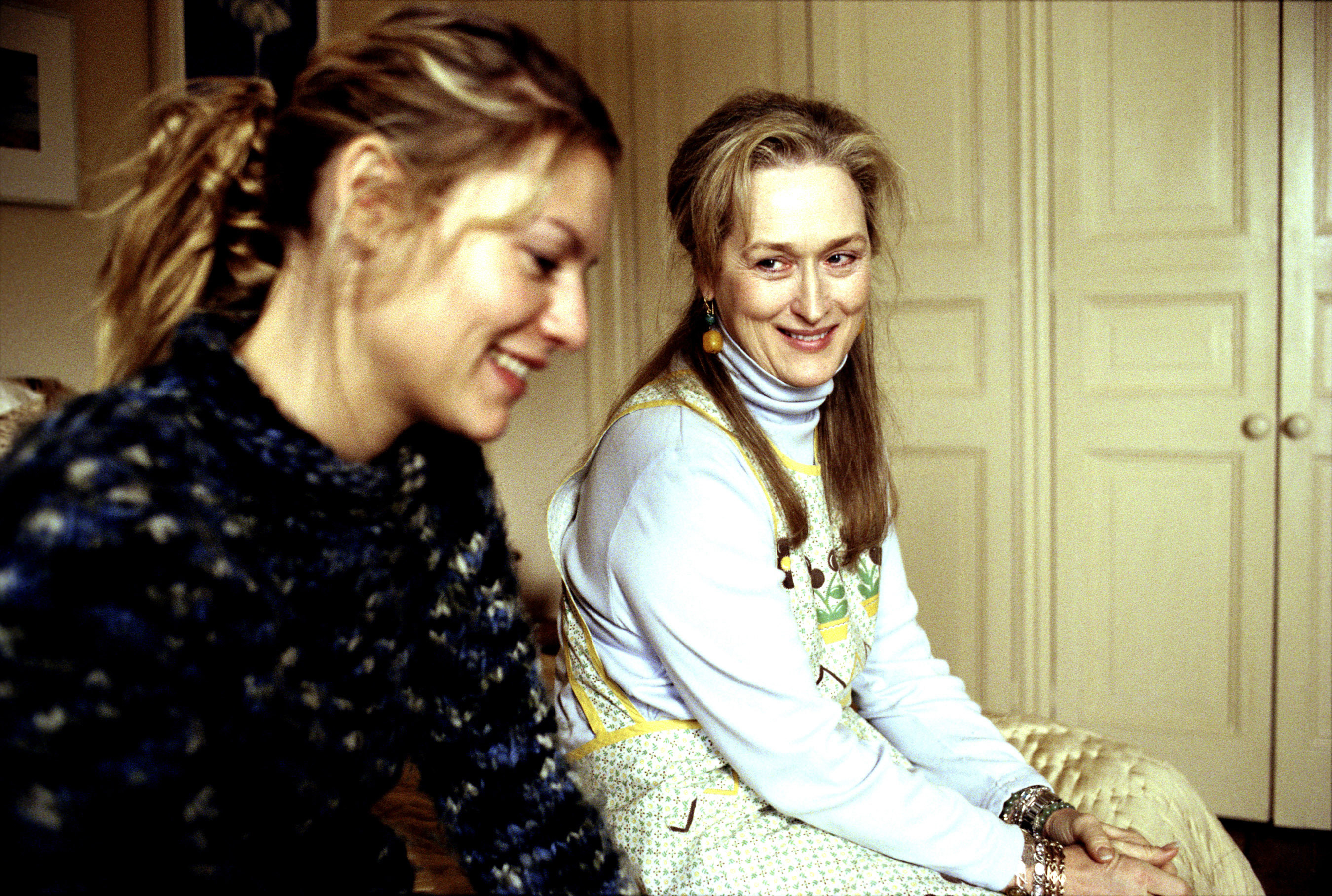 Claire Danes and Meryl Streep sit on a bed together