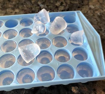 A customer review photo of their ice tray fill with ice