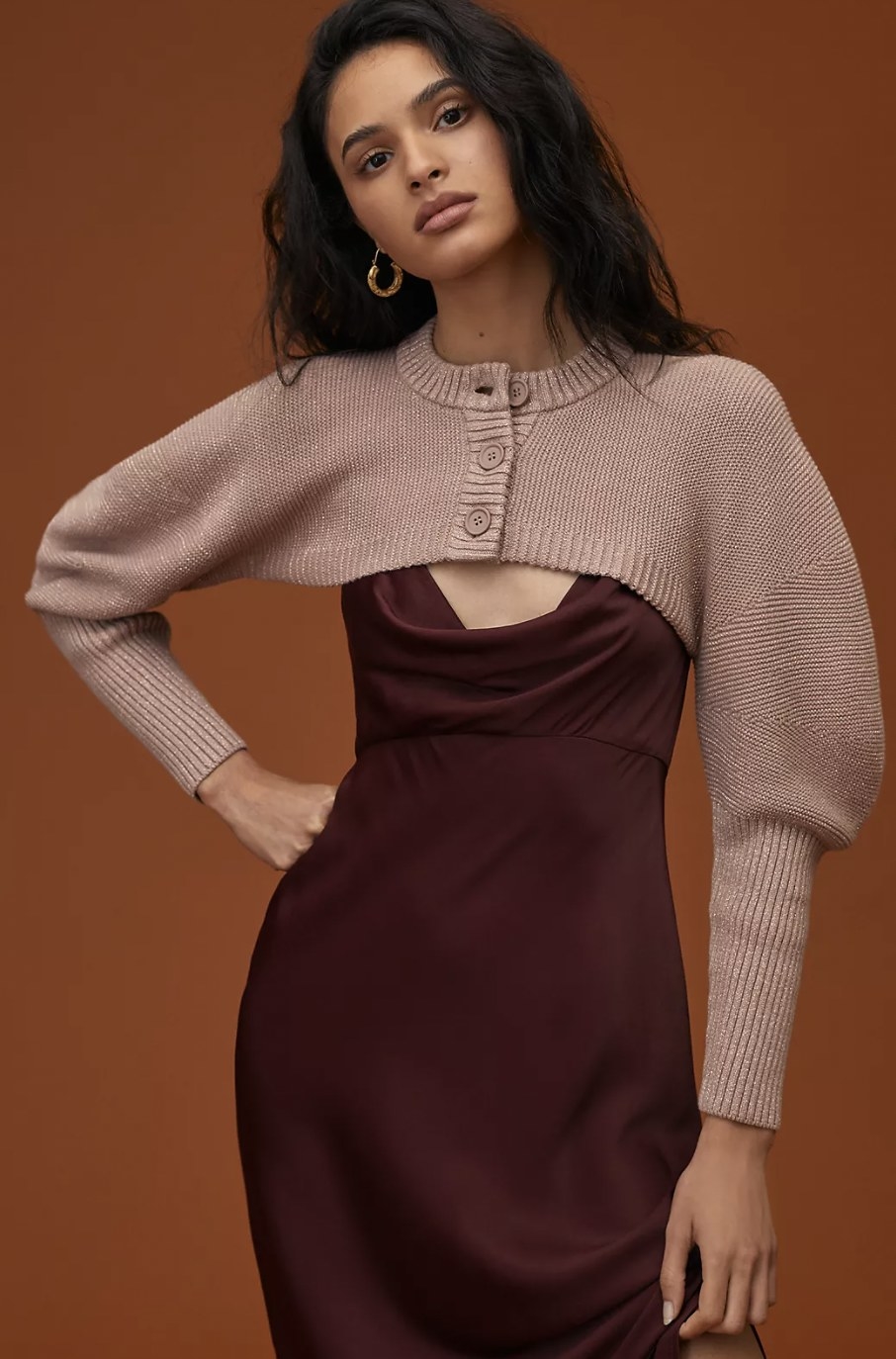 the shrug with three buttons and puffed sleeves