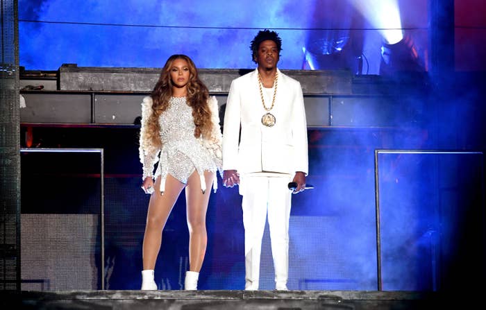 Beyonce and Jay-Z in matching white outfits from their On the Run II Tour