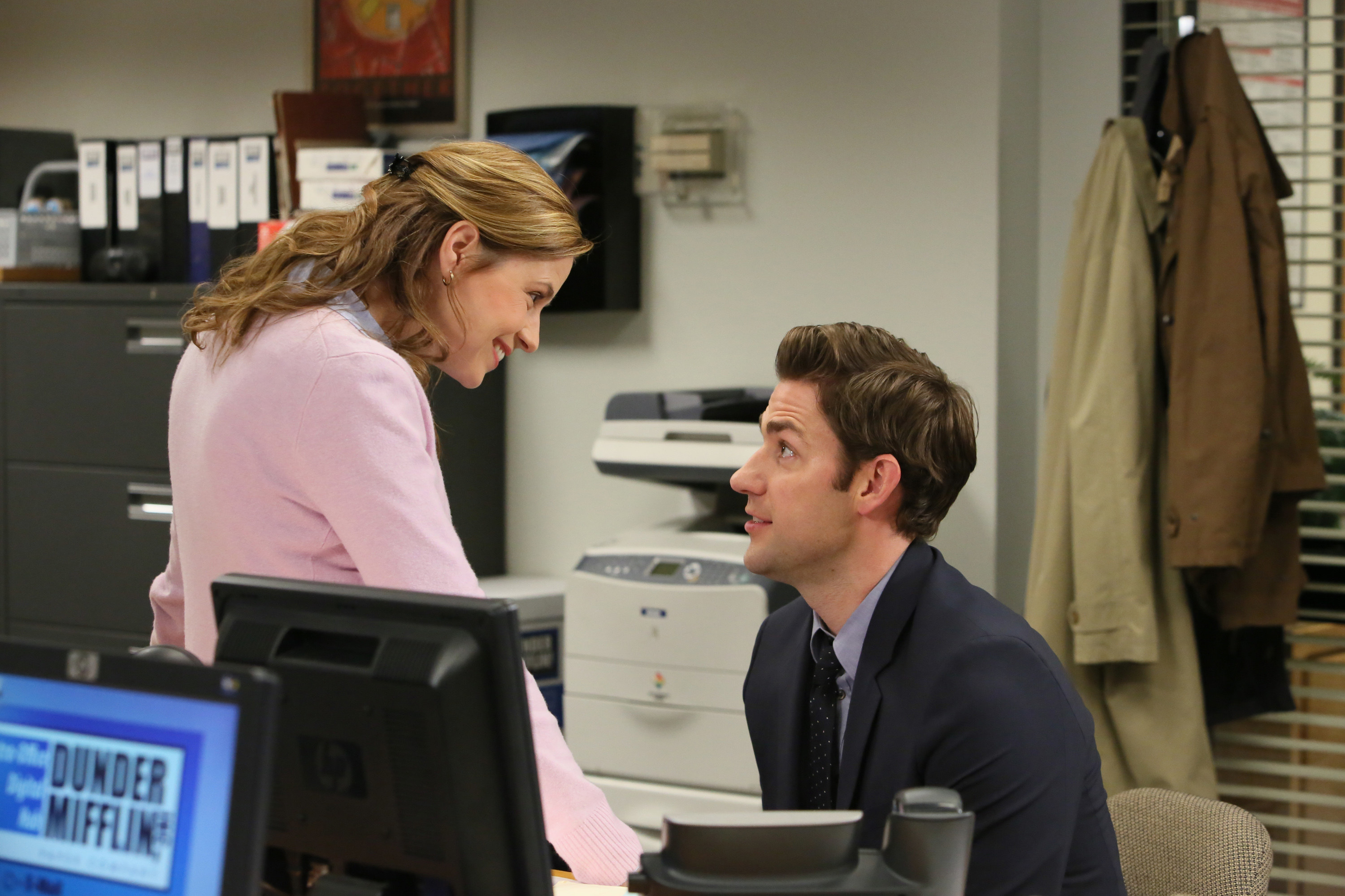 Jim and Pam talking in the office