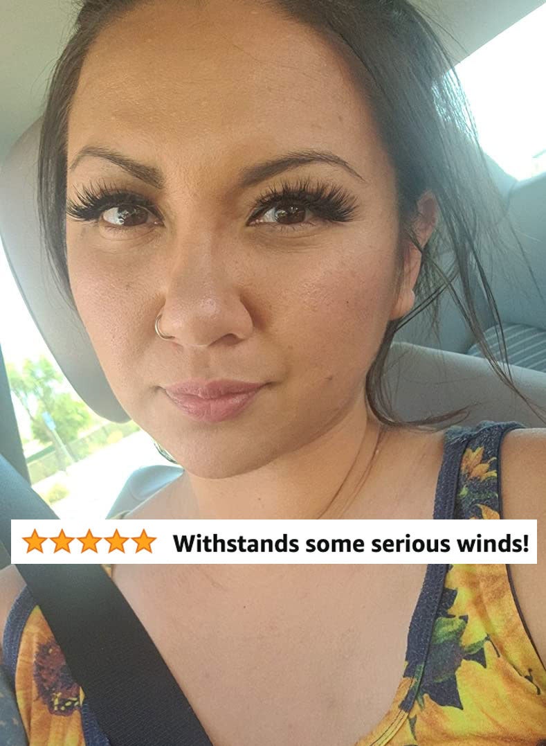 A reviewer wearing false eyelashes and review text &quot;withstands some serious winds&quot;