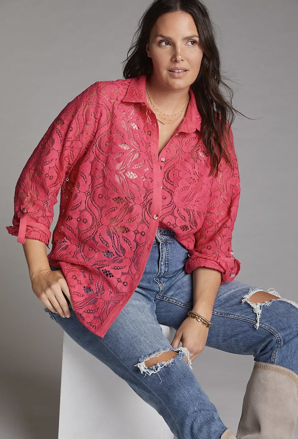 model wearing the lace button down in pink