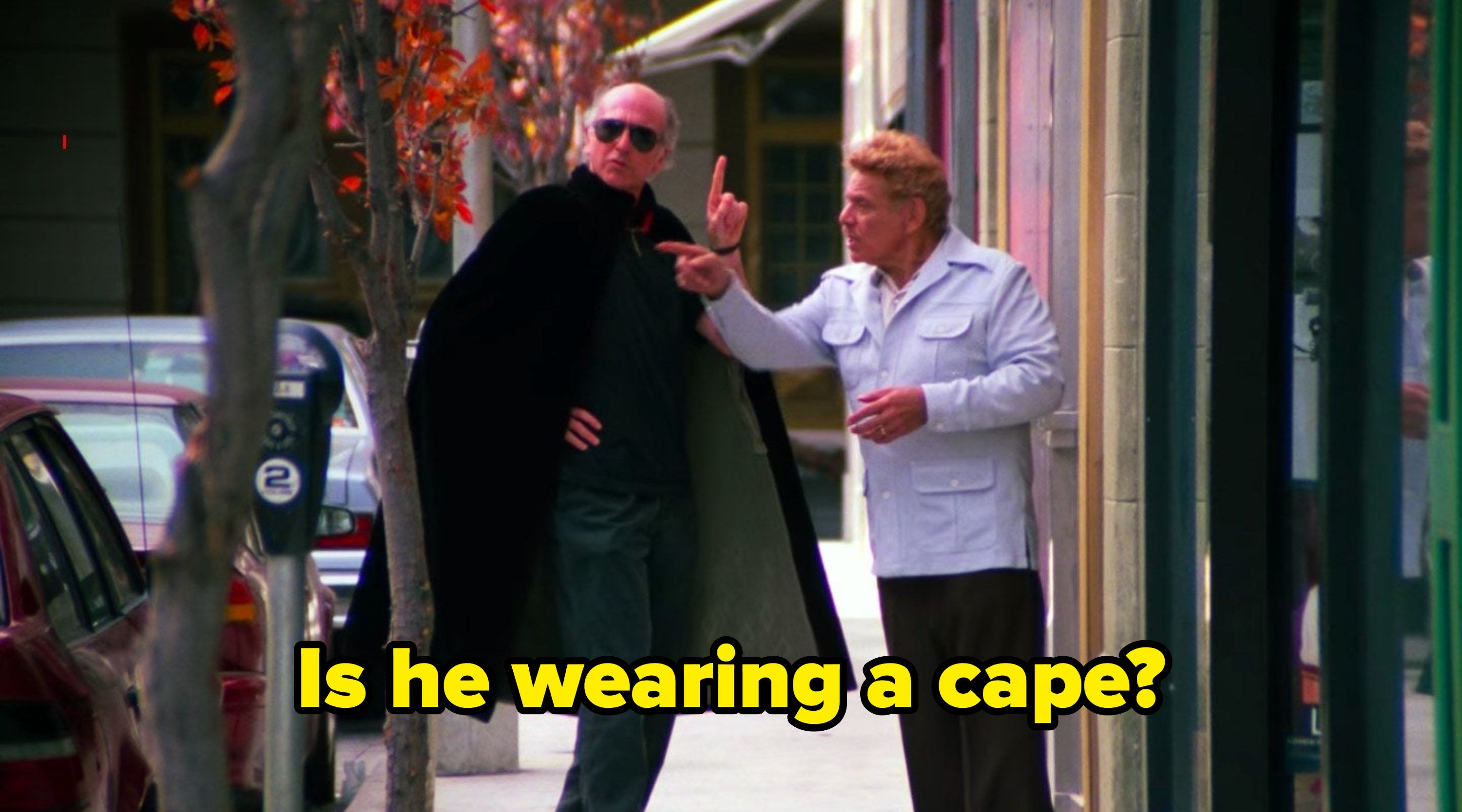 Frank Costanza talking to his lawyer on the sidewalk in "Seinfeld"