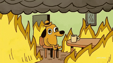 A cartoon dog sits at his kitchen table and calmly drinks coffee while his apartment is in flames