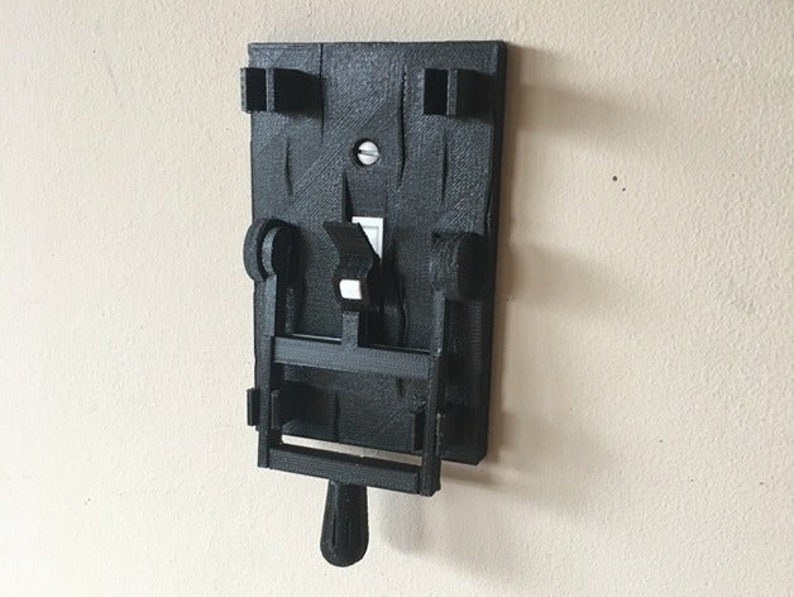 the black light switch plate with a control switch