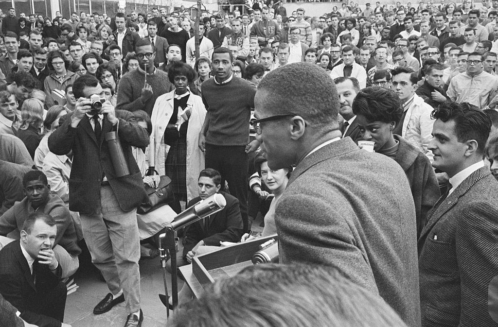 Malcolm X speaks to a large crowd