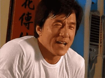 Jackie Chan licking his lips