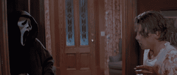 GIF of Billy being stabbed with an umbrella in Scream