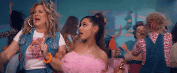 GIF of Jennifer and Ariana arm in arm