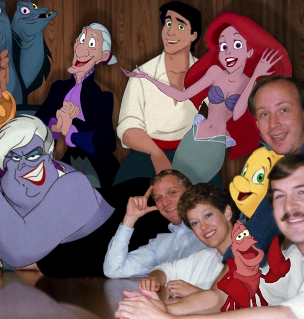 Howard Ashman and other crew members of &quot;The Little Mermaid&quot; are surrounded by characters from the animated film